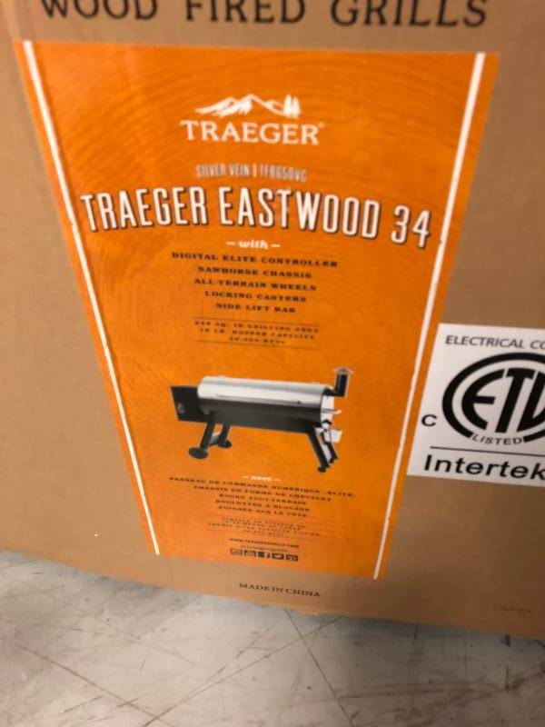 lot 102 image: Traeger Eastwood Series 34 in. Wood Pellet Grill in Silver Vein not used