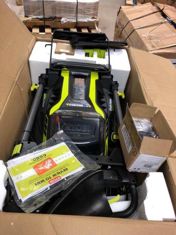 lot 105 image: Ryobi 20 in. 40-Volt Brushless Lithium-Ion Cordless Self-Propelled Walk Behind Mower - Two 5.0 Ah BatteriesCharger Included in good conditions