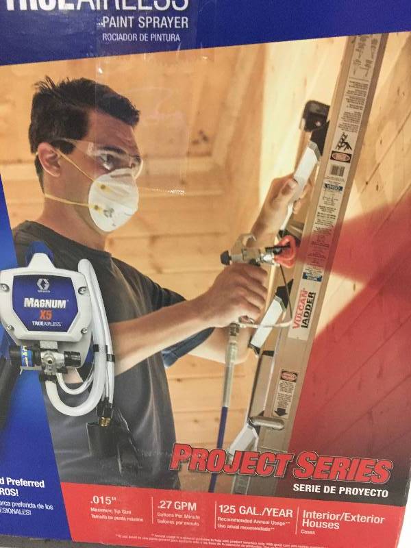 Magnum X5 Airless Paint Sprayer in working conditions