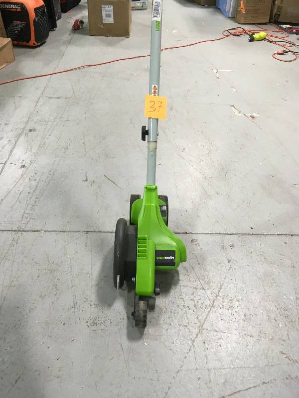 GREENWORKS 7.5 in. 12 Amp Walk-Behind Electric Edger in working conditions