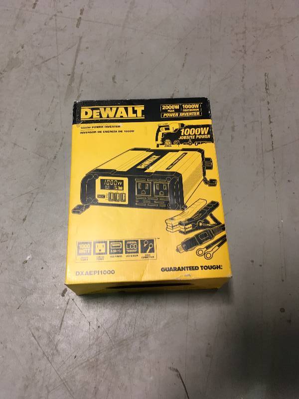 lot 26 image: DEWALT DXAEPI1000 Power Inverter 1000 Watt Continuous  2000 Watt Peak Power  Used in good working cond.