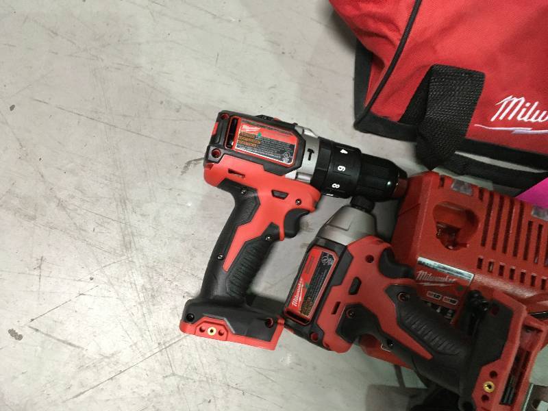 lot 41 image: Milwaukee M18 18-Volt Lithium-Ion Brushless Cordless Hammer DrillImpact Combo Kit Tool, 1  Battery, Charger, Bag in working conditions