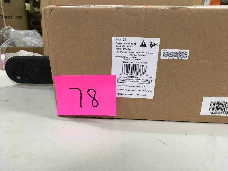 lot 78 image: Ryobi P548A 12 in. 18-Volt Brushless Lithium-Ion Electric Cordless Chainsaw TOOL ONLY OPEN BOX NOT USED in working conditions
