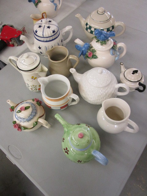 ASSORTMENT OF ORNATE PORCELAIN TEAPOTS