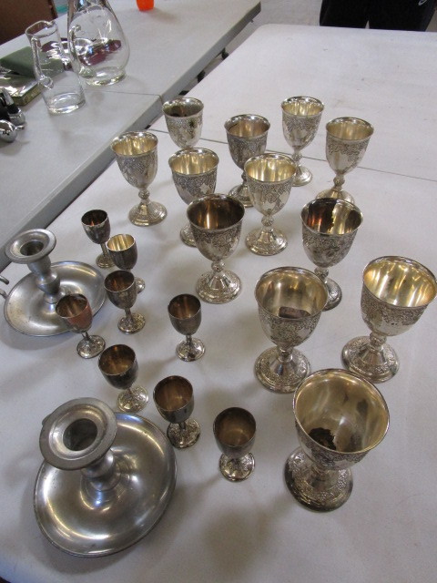 COLLECTION OF SILVER-PLATE CHALICES AND PEWTER CANDLESTICK HOLDERS