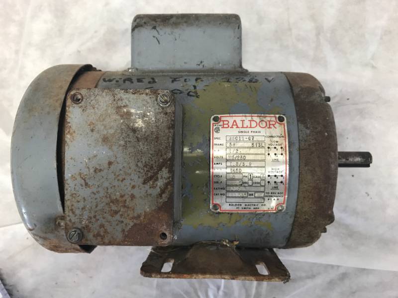 lot 33 image: Baldor 12 hp Motor Wired for 230V