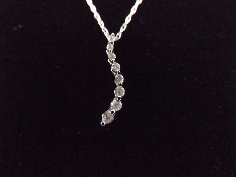 lot 51 image: 10k White Gold Diamond Pendant on 10k White Gold Chain