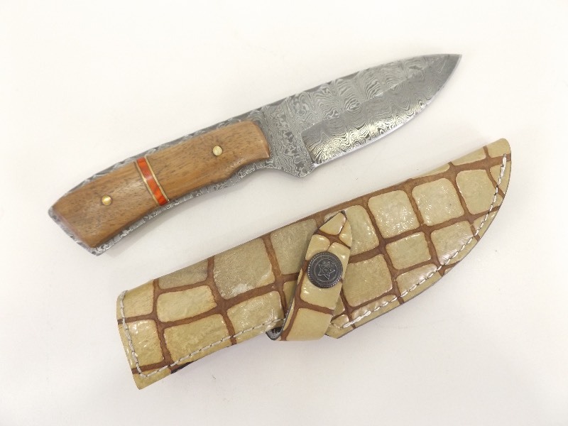 lot 29 image: Damascus Steel 4 Fixed Blade Knife in Animal Skin Sheath