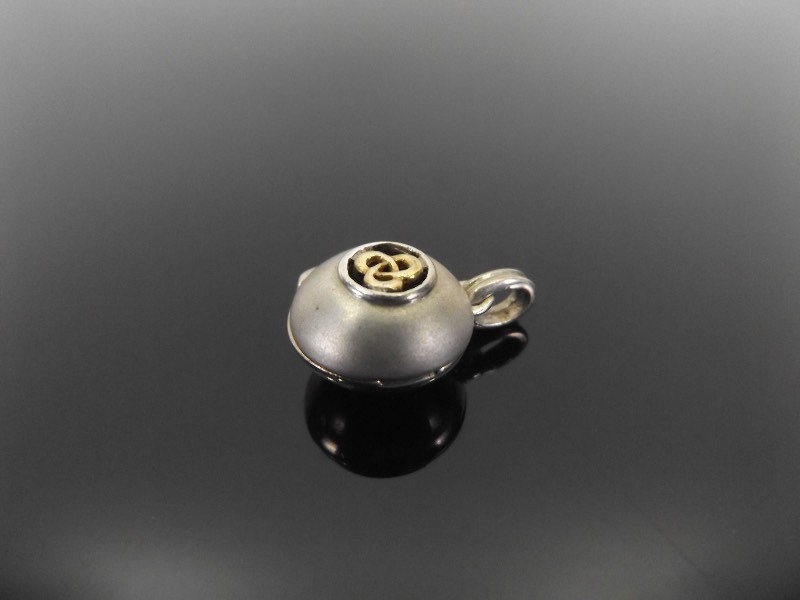lot 61 image: .925 Sterling Silver Celtic Knot Locket Pendant