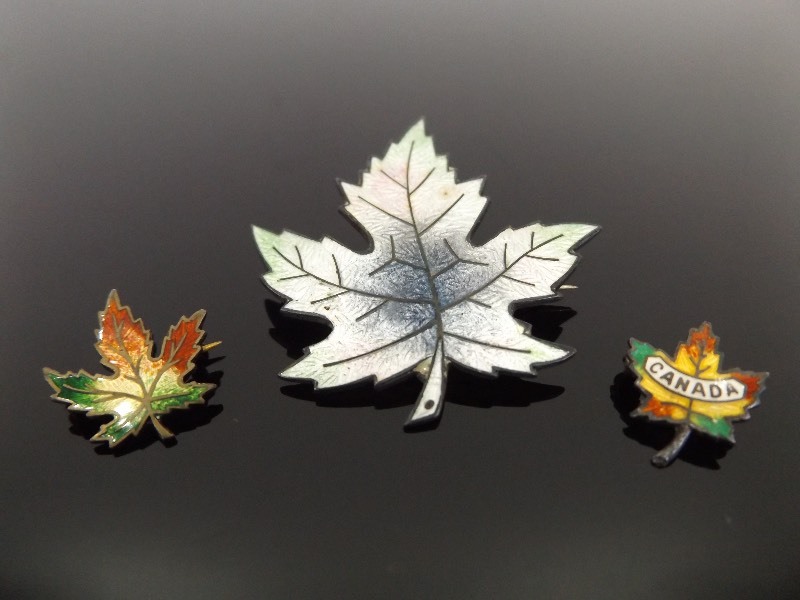 lot 63 image: 3 - .925 Sterling Silver Enameled Maple Leaf Brooches