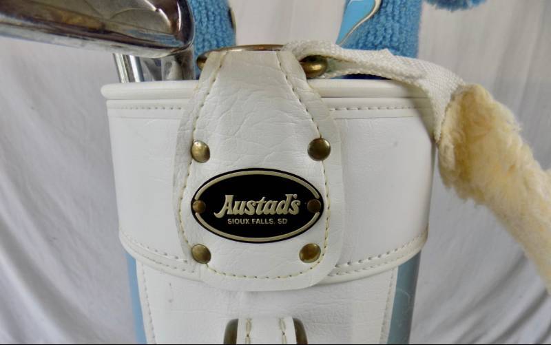 lot 20 image: Womens Right Handed Austads Cierra Blue Golf Clubs and Bag