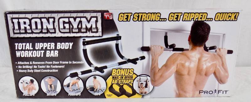 lot 26 image: New in Box Iron Gym - Total Upper Body Workout Bar  (new condition) Tony Horton, Bring It Hard Cover Book  Mens Health Training Guide 2013