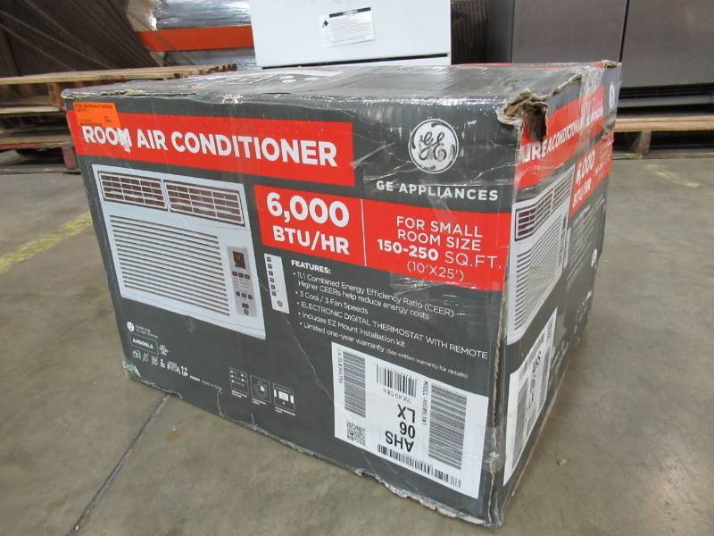 lot 50 image: GE 250-sq ft Window Air Conditioner 6,000 BTU With Remote