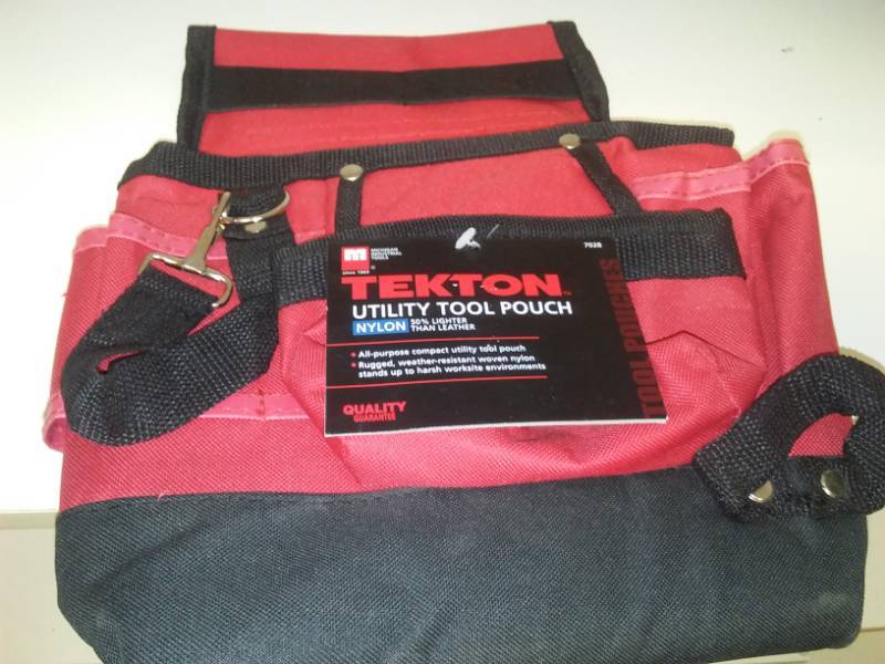 lot 12 image: All new auto phone holder, tool punch, lunch cooler. New with tags.