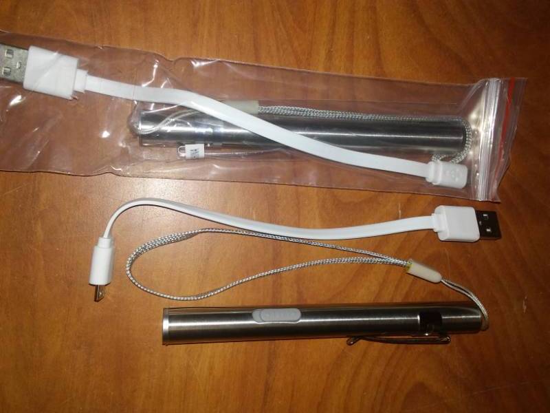 lot 42 image: NEW 2 USB rechargeable flashlights. Great idea for Christmas,