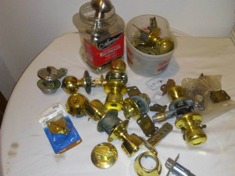 lot 49 image: Door knob sets, deadbolts, sash Locks and More.