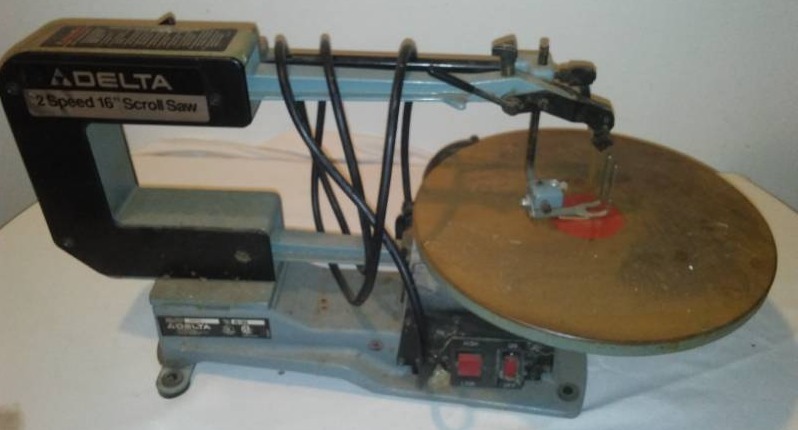 lot 51 image: Delta 2 speed 16 inch scroll saw.