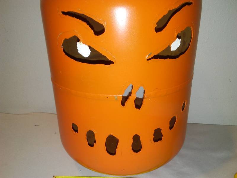lot 68 image: Metal pumpkin head cut metal.