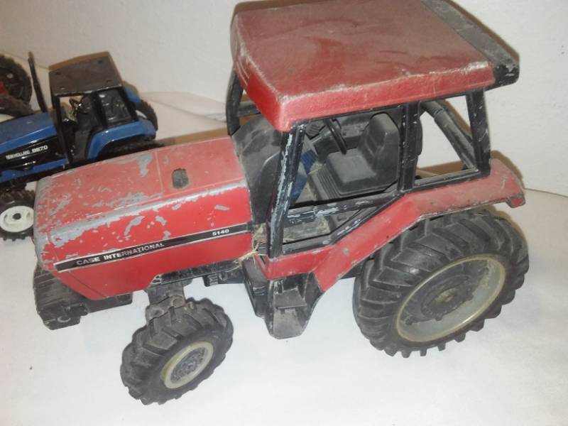 lot 74 image: Vintage metal toys, tractors, cars.