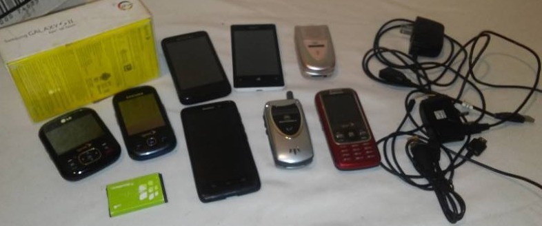 lot 77 image: cell phones - smart, flip and cords.