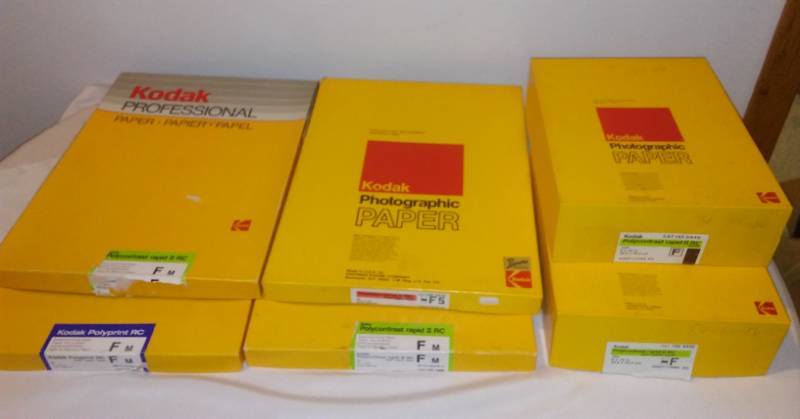 lot 83 image: 6 packages of Kodak photo paper full mostly full. Near line