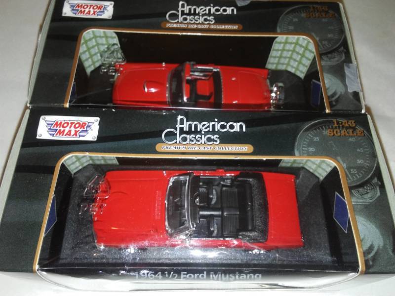 lot 111 image: 2 Ford Thunderbird and Mustang convertible.