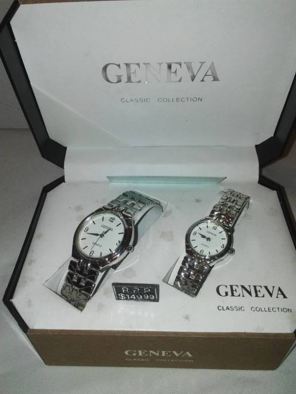 lot 150 image: Geneva his and hers watches.