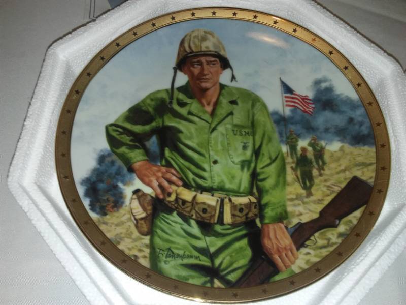 lot 164 image: 2 John Wayne plates. Symbol of leadership and Americas fighting forces.