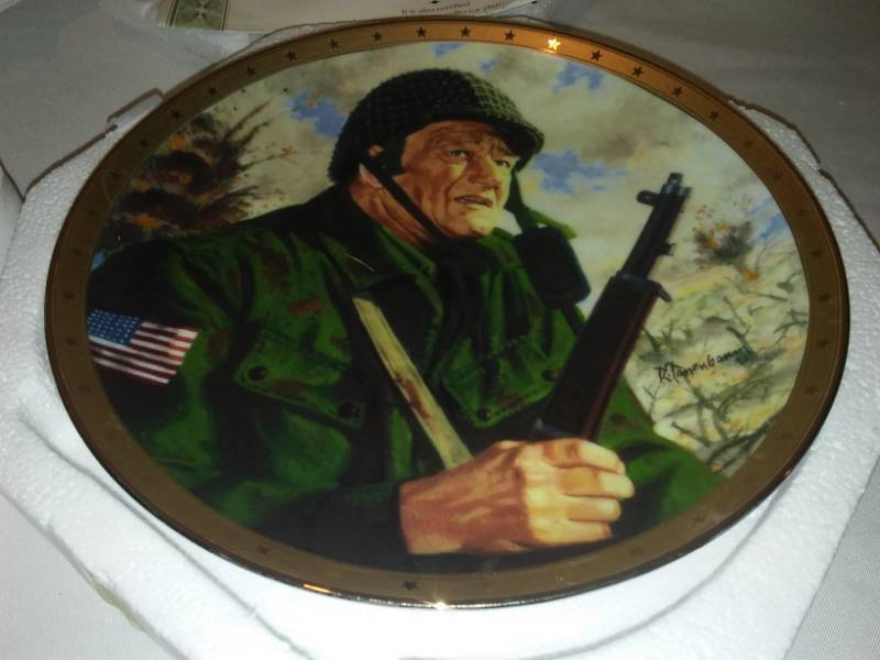 lot 167 image: 2 John Wayne plates. Green Beret, Salute to the Soldier.