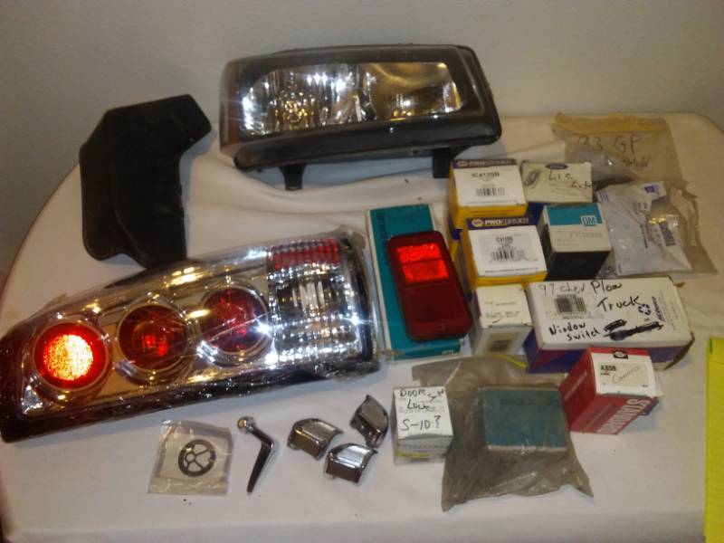 lot 194 image: Automotive lights, switches, knobs and more.