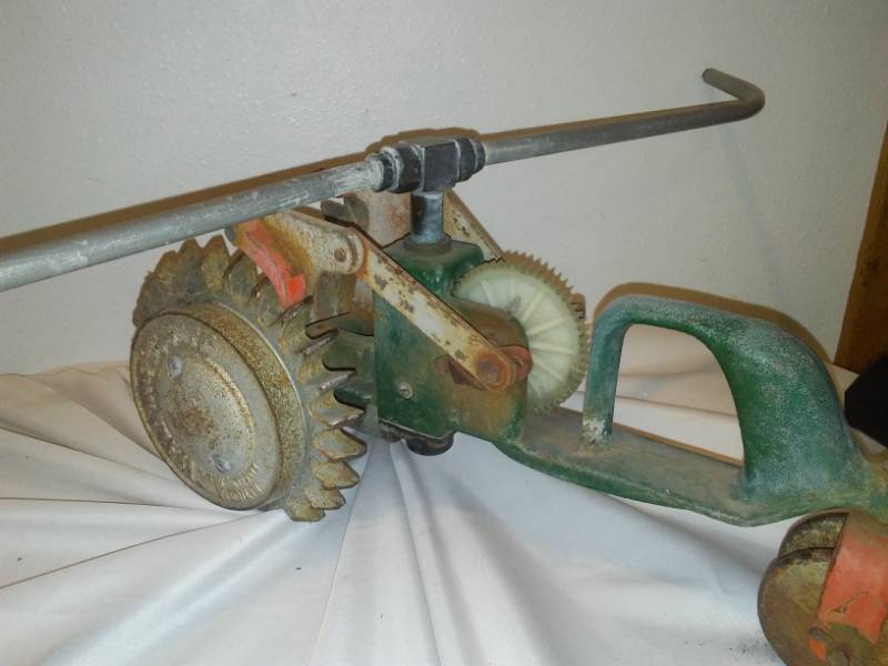 lot 198 image: Tractor walking sprinkler.