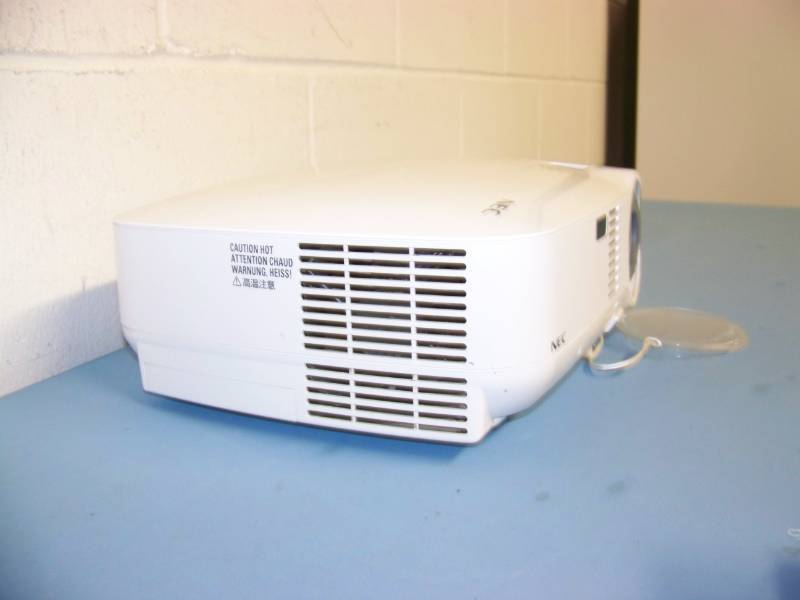 lot 3 image: NEC, LCD Projector, (8) NEW Digital Decoration Holiday  Celebration DVDs and (2) NEW Projection Materials (Window and Hologram)