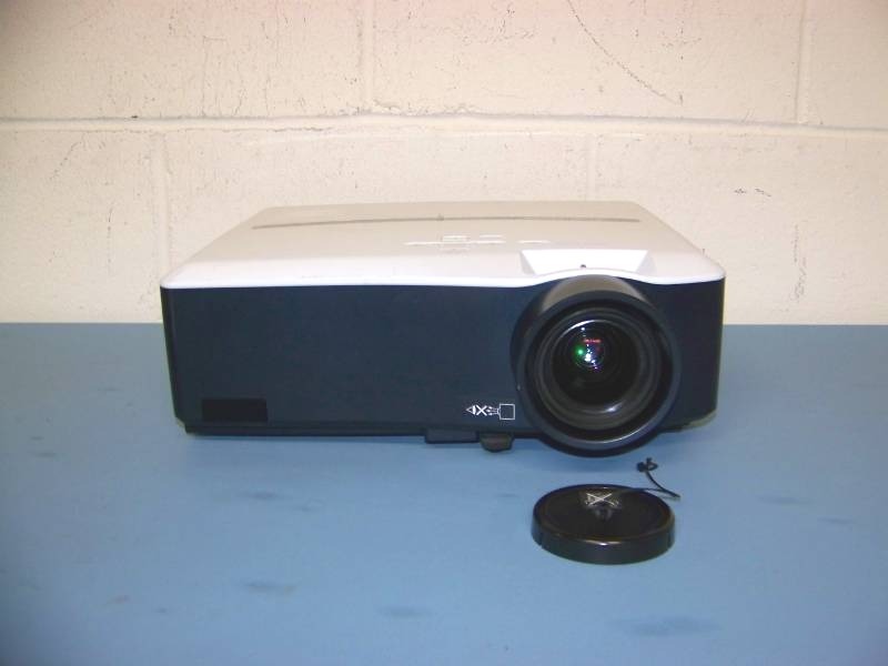 lot 2 image: Mitsubishi, LCD Projector with (8) NEW Digital Decoration Holiday  Celebration DVDs and (2) NEW Projection Materials (Window and Hologram)