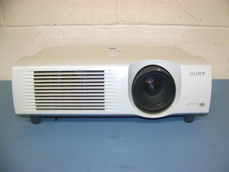 lot 4 image: Sony, SuperBright, LCD Projector with (8) NEW Digital Decoration Holiday  Celebration DVDs and (2) NEW Projection Materials (Window and Hologram)