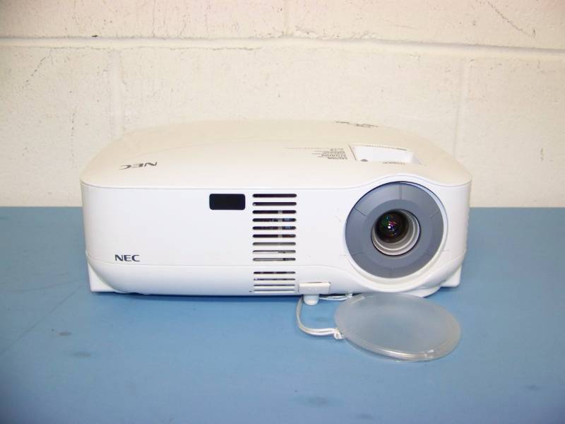 lot 13 image: NEC, LCD Projector, (6) NEW Digital Decoration Holiday  Celebration DVDs and (2) NEW Projection Materials (Window and Hologram)
