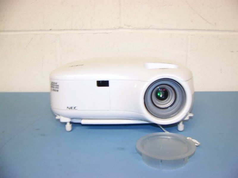 lot 15 image: NEC, LCD Projector, (5) NEW Digital Decoration Holiday  Celebration DVDs and (2) NEW Projection Materials (Window and Hologram)