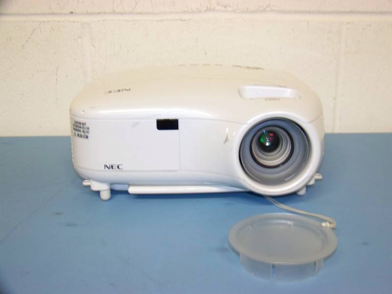 lot 16 image: NEC, LCD Projector, (5) NEW Digital Decoration Holiday  Celebration DVDs and (2) NEW Projection Materials (Window and Hologram)