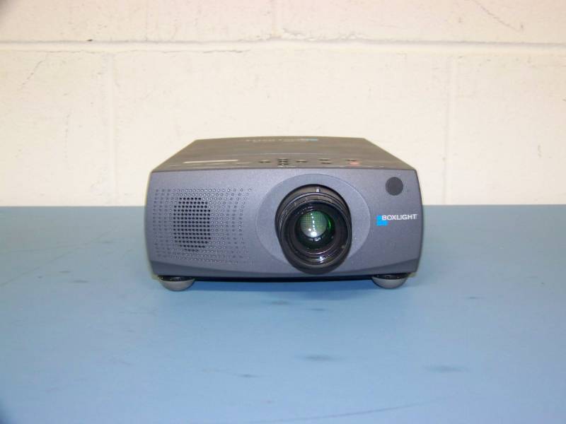lot 24 image: BoxLight, LCD Projector, (3) NEW Digital Decoration Holiday  Celebration DVDs and (2) NEW Projection Materials (Window and Hologram)