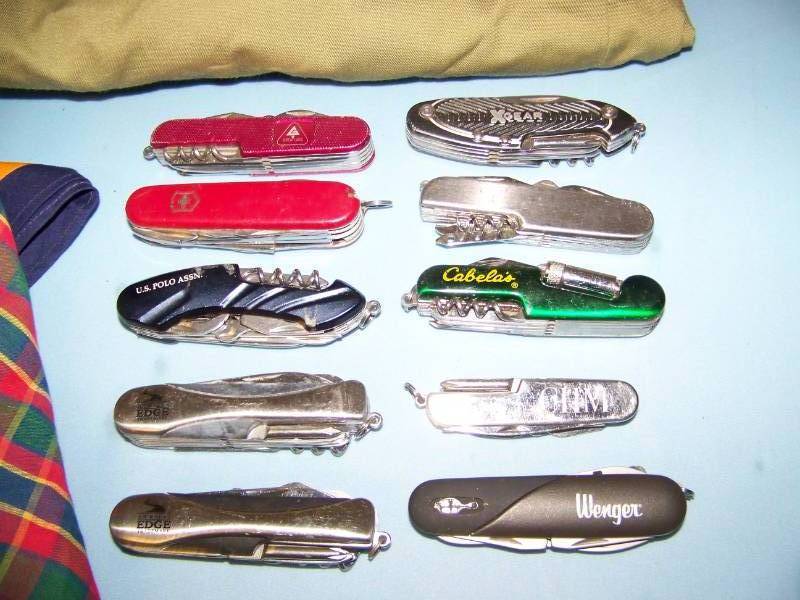 lot 84 image: Cub Scout  Boy Scout Neckerchiefs, Hat, Belt, Pants and Utility  Multi-Tool  Pocket Knives