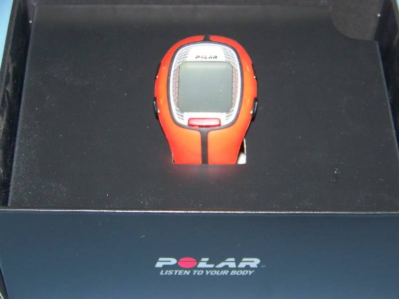 lot 105 image: (7) Kids Baseball Bats, (2) Small-Sized Tennis Rackets, (2) Stop Watches and (1) Polar Heart Rate Monitor  Sports Watch in Original Box