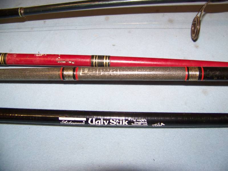 lot 93 image: (7) Fishing Rods  Poles with Reels and (3) Fishing Rods  Poles