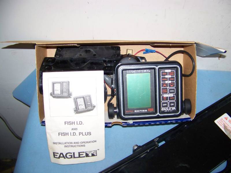 lot 95 image: MotorGuide, Digital Trolling Motor with Foot Pedal Control, Eagle Fish I.D. Tracker  Finder and Canvas Tarp for 17 Fishing Boat