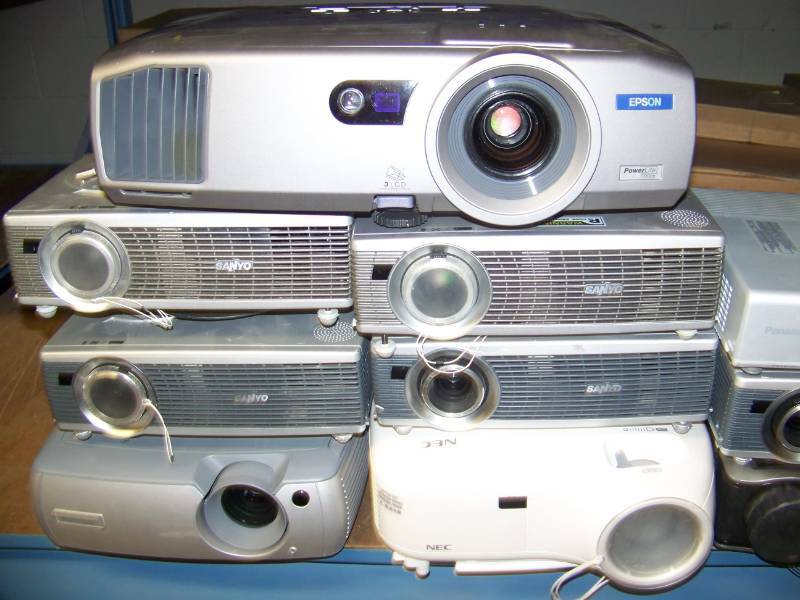 lot 79 image: (8 Wide Shelf plus - LARGE LOT) Miscellaneous Projectors for PARTS  REPAIR