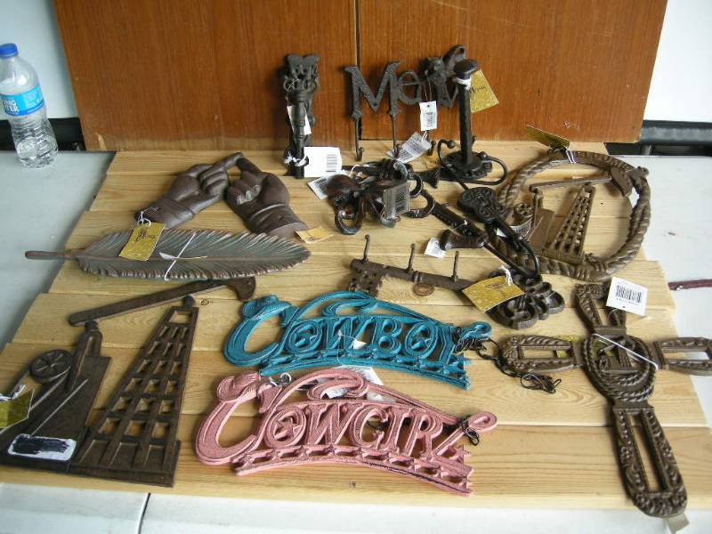 lot 93 image: Cast Iron Western Decor