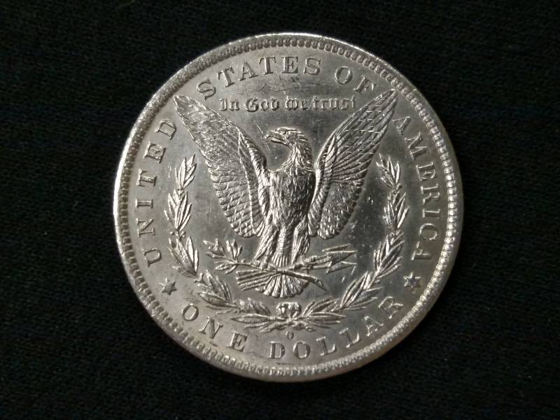 lot 10 image: 1884 O MS Morgan Silver Dollar...