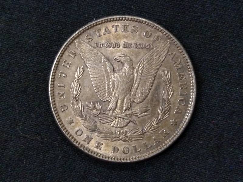 lot 13 image: 1886 Morgan Silver Dollar...