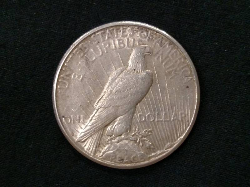 lot 22 image: 1922 S Peace Silver Dollar...