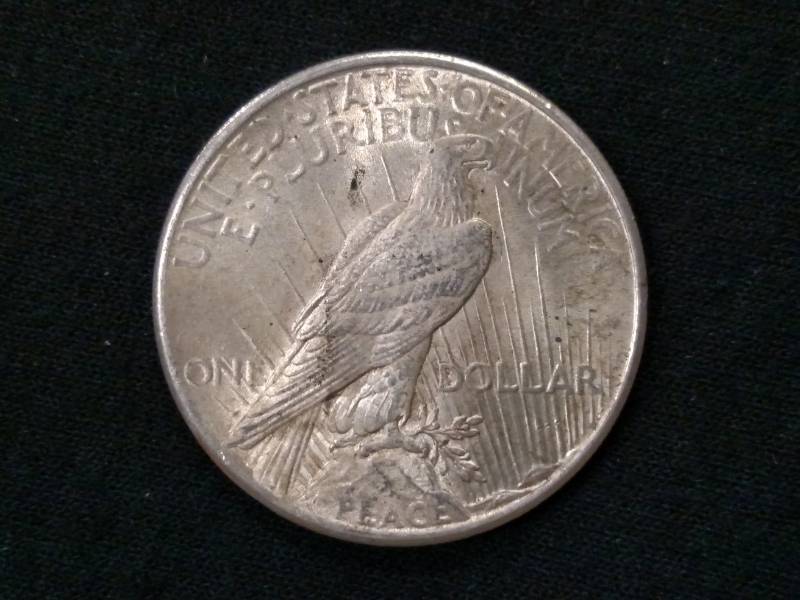 lot 25 image: 1924 Peace Silver Dollar...