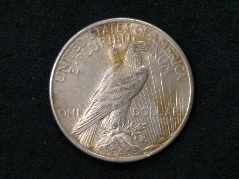 lot 26 image: 1925 Peace Silver Dollar...