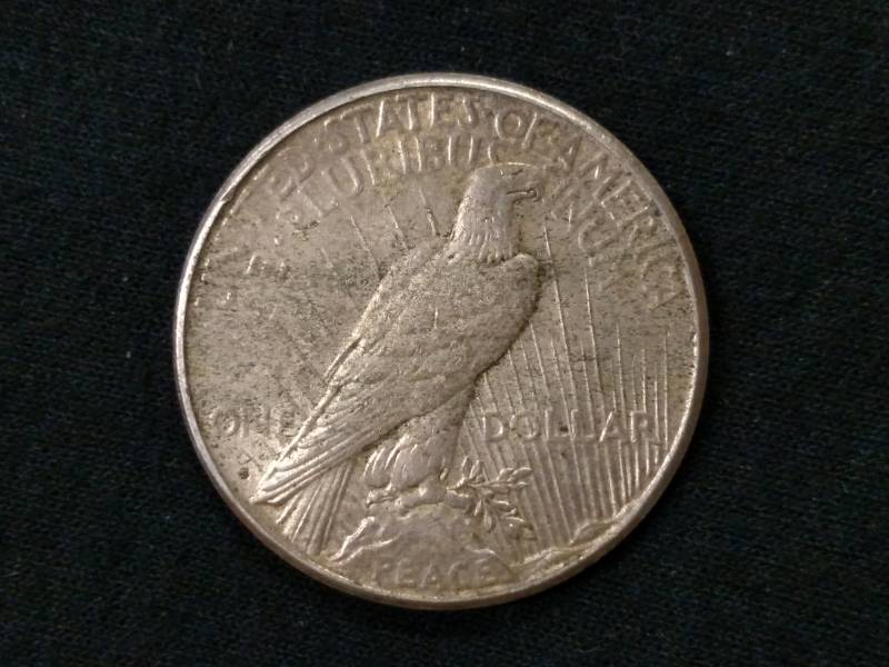 lot 27 image: 1925 S Peace Silver Dollar...